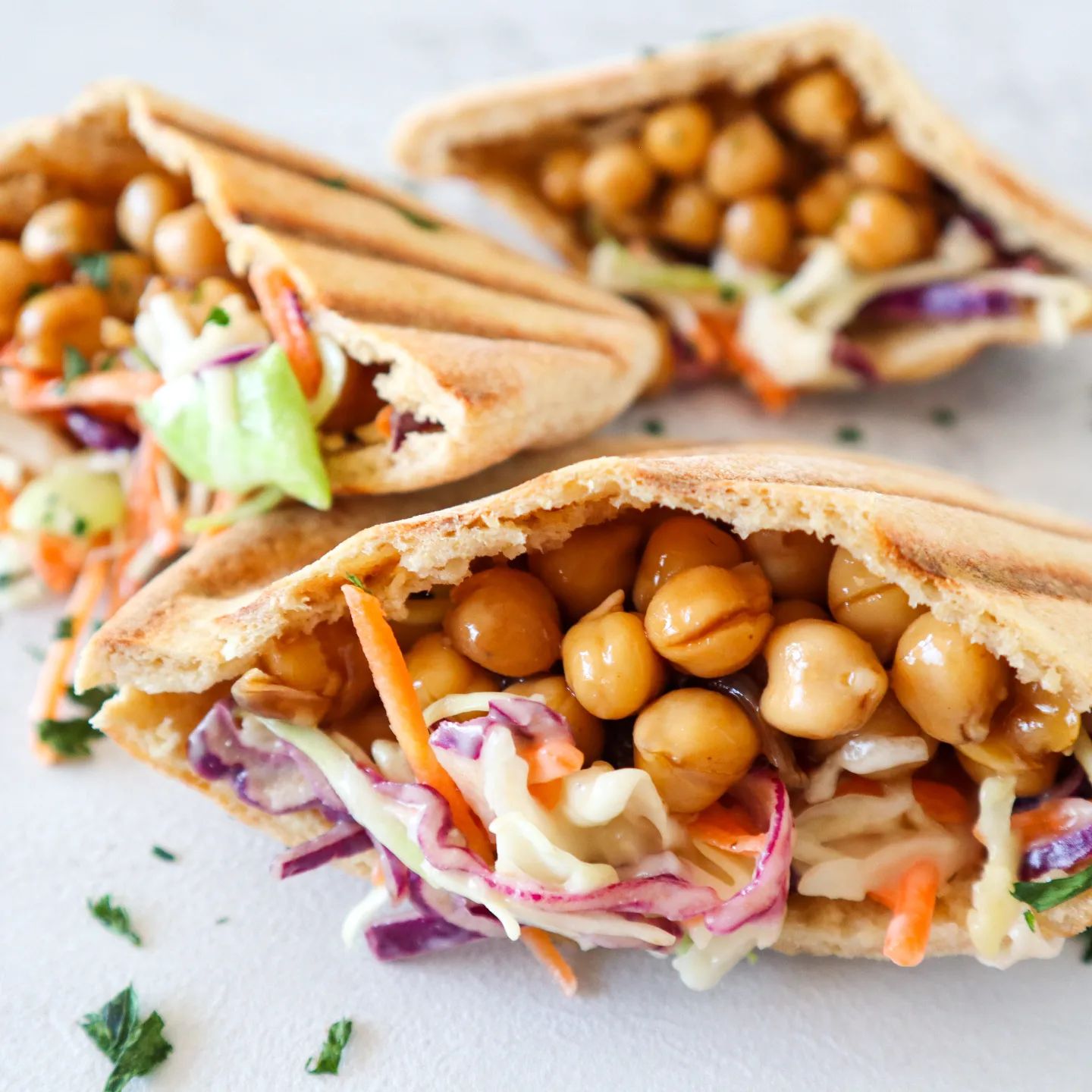 These BBQ chickpea wraps are Mr 6's favourite lunch right now! 

Yep! Mr 6 actually loves something with chickpea in it!!! 

I'll be honest, the chickpeas are probably just a vehicle to get more BBQ sauce in, but I'll still take it! 🤣

This recipe works well for school lunches, too! 😉

BBQ Chickpea Wraps

Prep Time: 10 mins
Total Time: 10 mins
Servings (total): 5

2 ½ cups Coleslaw Mix
2 Tbs 2 tsp Vegan Mayonnaise
2 400g tins Chickpeas
⅓ cup BBQ Sauce
5 whole Wholemeal Wraps

1. Add the coleslaw mix and mayonnaise to a medium bowl. Mis thorugh until the coleslaw is coated.
2. Rinse and drain the chickpeas. Try to remove as much liquid as possible from the chickpeas to stop the wraps from going soggy.
3. Add chickpeas to a medium bowl. Stir through the BBQ sauce until evenly coated.
4. Prepare the wraps (you may need to heat them slightly to make them pliable).
5. Spoon about 1/5 of the coleslaw mix onto the wrap, then top with 1/5 of the chickpeas. Wrap up to enclose the filling.

#vegannutritionist #vegancoaching #veganmom #veganmum #veganparentsofig #healthyvegankids  #vegankidsofig #veganrecipes #vegannutrtitioncoach #vegankidsnutrition #veganparentsaustralia #vegan #veganlunch #veganlunchbox #veganlunchideas #vegannutfree #vegankids #veganworklunch #plantbasedkids #plantbasedlunch